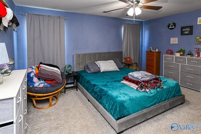 carpeted bedroom featuring ceiling fan