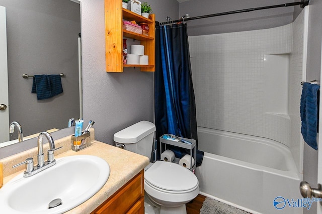 full bathroom featuring toilet, vanity, and shower / bath combination with curtain