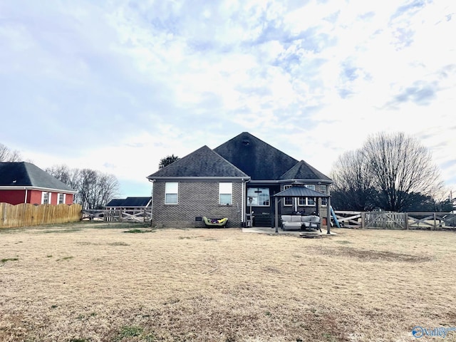 rear view of house with a gazebo