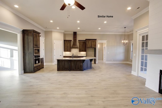 BELLEWOOD-B Mallard Dr, Madison, AL 35756 - kitchen featuring stainless steel oven, ceiling fan, light countertops, custom range hood, and light wood-style flooring