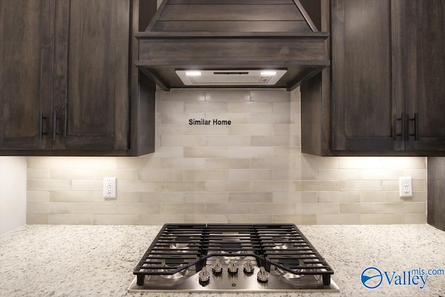 BELLEWOOD-B Mallard Dr, Madison, AL 35756 - kitchen with dark brown cabinets, stainless steel gas stovetop, and backsplash