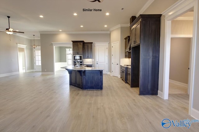 BELLEWOOD-B Mallard Dr, Madison, AL 35756 - kitchen with a ceiling fan, stainless steel appliances, a kitchen island with sink, a breakfast bar, and open floor plan