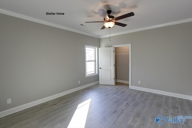 BELLEWOOD-B Mallard Dr, Madison, AL 35756 - unfurnished bedroom with ornamental molding, wood finished floors, and a ceiling fan