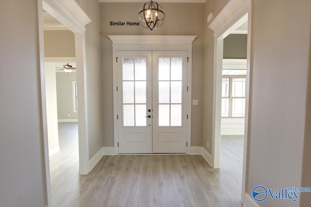 BELLEWOOD-B Mallard Dr, Madison, AL 35756 - foyer entrance with french doors, light wood-style floors, a chandelier, and plenty of natural light