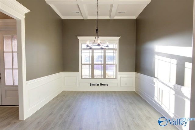 BELLEWOOD-B Mallard Dr, Madison, AL 35756 - unfurnished dining area with a chandelier, light wood-style flooring, ornamental molding, beamed ceiling, and wainscoting