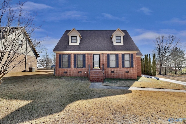 new england style home with central AC and a front lawn