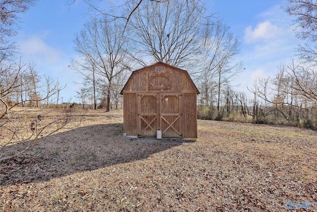 view of outdoor structure featuring a rural view