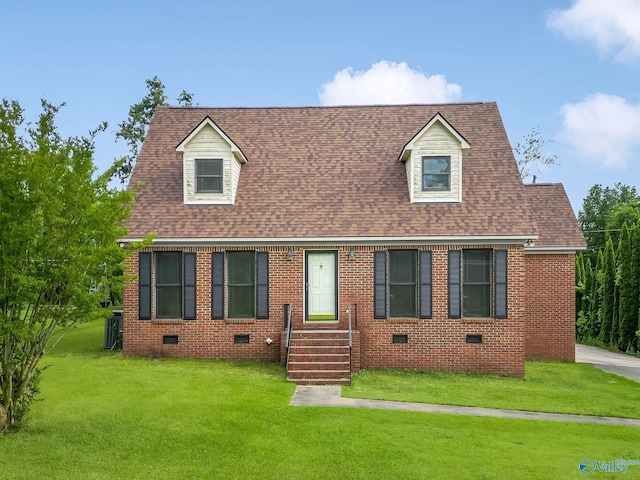 1222 Lane Rd, Hartselle, AL 35640 - new england style home featuring a front lawn, roof with shingles, brick siding, and crawl space