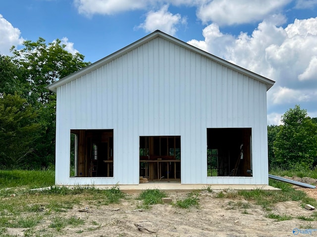 back of property with an outbuilding