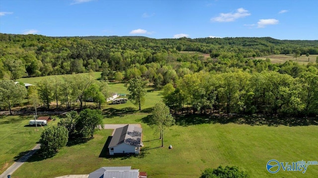 drone / aerial view with a forest view
