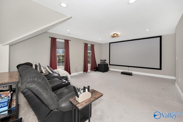 home theater with light carpet