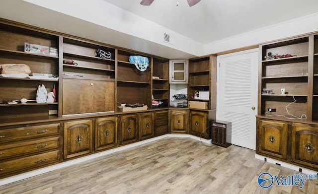 office with visible vents, ceiling fan, and light wood finished floors