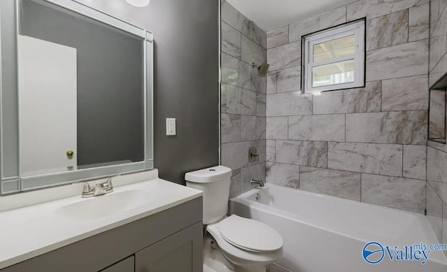 full bath with toilet, shower / bathtub combination, and vanity