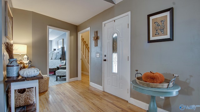 entrance foyer with light hardwood / wood-style floors