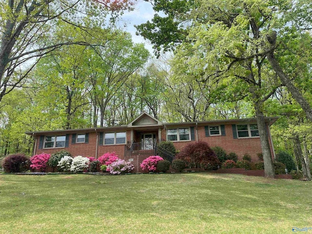 6818 Criner Rd SE, Huntsville, AL 35802 - single story home with brick siding and a front yard
