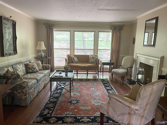 6818 Criner Rd SE, Huntsville, AL 35802 - living area with wood finished floors, healthy amount of natural light, ornamental molding, a premium fireplace, and a textured ceiling