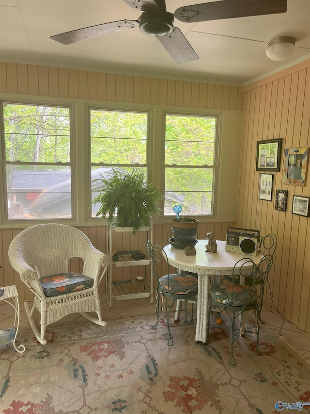 6818 Criner Rd SE, Huntsville, AL 35802 - dining area with ceiling fan and wood walls