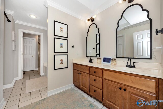 2616 Bransford Trl SE, Owens Cross Roads, AL 35763 - bathroom with tile patterned floors, double vanity, a sink, and ornamental molding