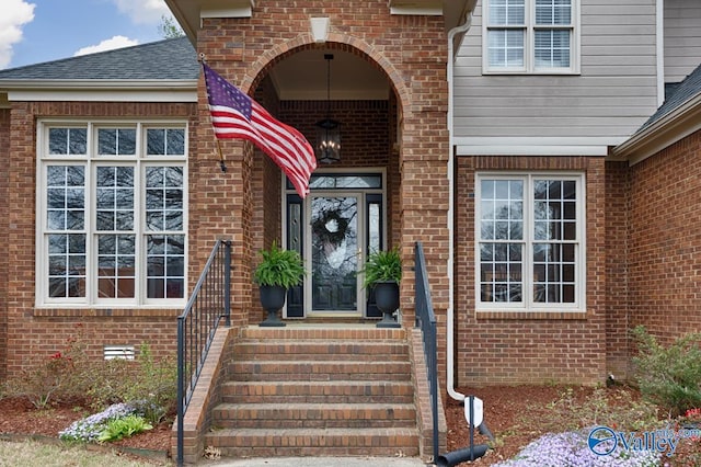 2616 Bransford Trl SE, Owens Cross Roads, AL 35763 - doorway to property with brick siding and a shingled roof