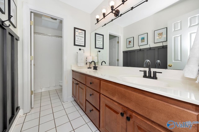 2616 Bransford Trl SE, Owens Cross Roads, AL 35763 - bathroom featuring toilet, tile patterned floors, double vanity, and a sink