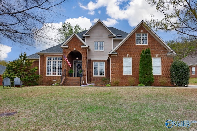 2616 Bransford Trl SE, Owens Cross Roads, AL 35763 - traditional-style house with brick siding and a front lawn