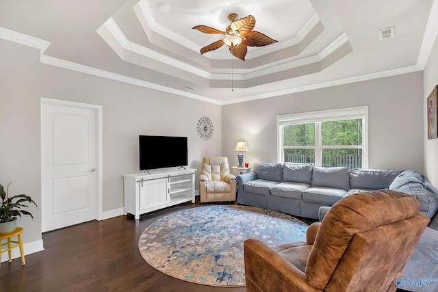158 Kenton Ln, Madison, AL 35756 - living room featuring visible vents, a ceiling fan, crown molding, a tray ceiling, and dark wood-type flooring