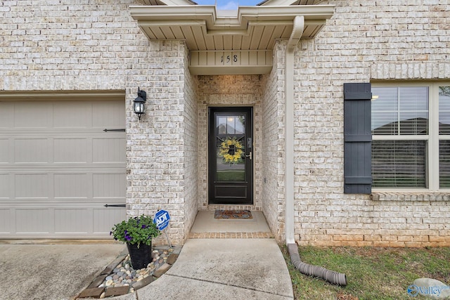 158 Kenton Ln, Madison, AL 35756 - doorway to property with a garage and brick siding