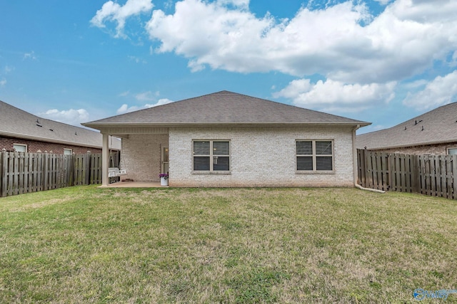 158 Kenton Ln, Madison, AL 35756 - rear view of house with a patio area, a fenced backyard, and a lawn