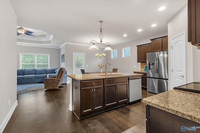 158 Kenton Ln, Madison, AL 35756 - kitchen with dark brown cabinetry, dark wood-style floors, a kitchen island with sink, appliances with stainless steel finishes, and a sink