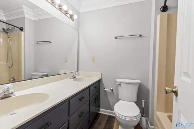 full bathroom with ornamental molding, shower / tub combination, vanity, and toilet