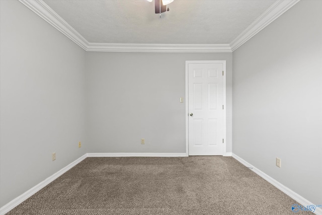 carpeted spare room featuring a textured ceiling, ceiling fan, and crown molding