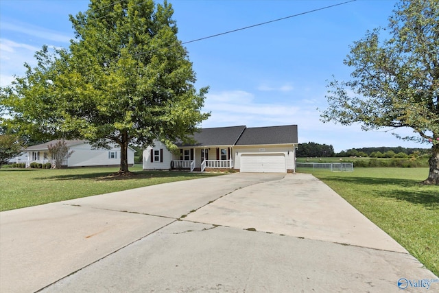 ranch-style home with a front lawn, a porch, and a garage