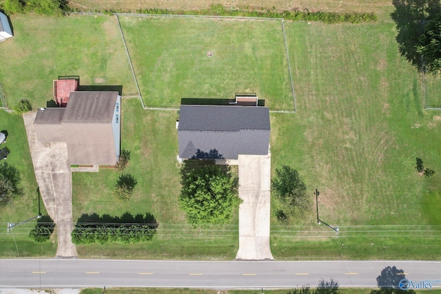 birds eye view of property featuring a rural view