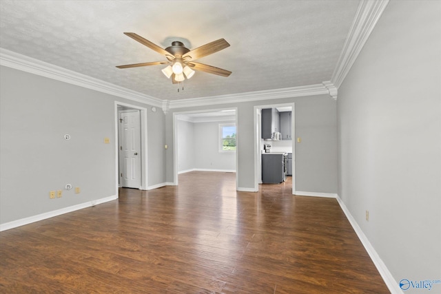 interior space with ceiling fan, ornamental molding, and dark hardwood / wood-style flooring