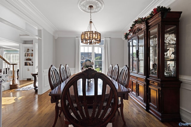2907 Madrey Ln, Hampton Cove, AL 35763 - dining room with crown molding, built in features, a chandelier, and dark wood-style floors