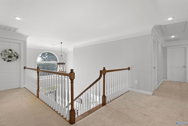 2907 Madrey Ln, Hampton Cove, AL 35763 - hallway featuring carpet floors, visible vents, ornamental molding, attic access, and an upstairs landing