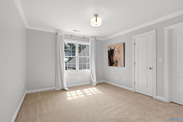 2907 Madrey Ln, Hampton Cove, AL 35763 - carpeted spare room featuring baseboards, ornamental molding, and visible vents