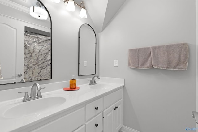 2907 Madrey Ln, Hampton Cove, AL 35763 - bathroom featuring double vanity, baseboards, vaulted ceiling, and a sink
