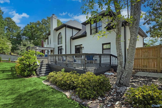 2907 Madrey Ln, Hampton Cove, AL 35763 - rear view of property featuring a wooden deck, fence, and a chimney