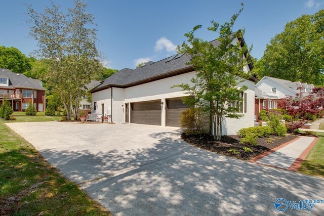 2907 Madrey Ln, Hampton Cove, AL 35763 - view of home's exterior with a garage and driveway