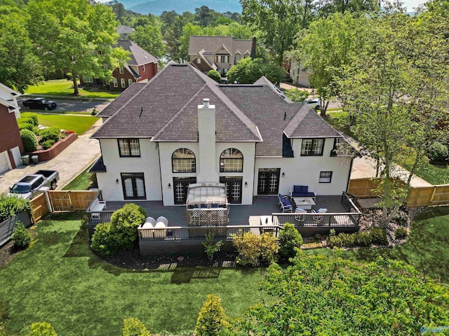 2907 Madrey Ln, Hampton Cove, AL 35763 - back of house with french doors, a deck, a fenced backyard, a shingled roof, and stucco siding