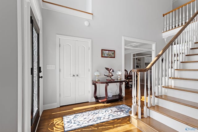 2907 Madrey Ln, Hampton Cove, AL 35763 - entrance foyer featuring baseboards, a high ceiling, stairs, and wood finished floors