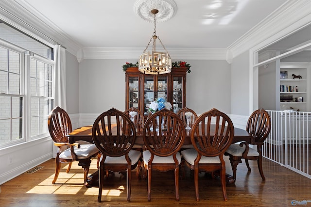 2907 Madrey Ln, Hampton Cove, AL 35763 - dining area with a chandelier, ornamental molding, and plenty of natural light