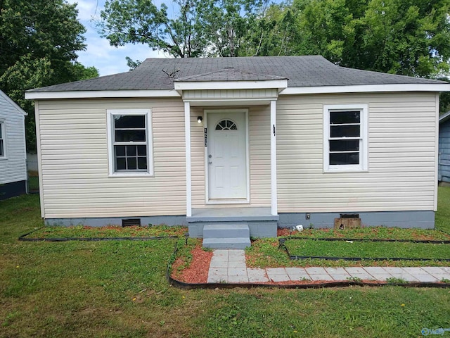 view of front of house with a front yard