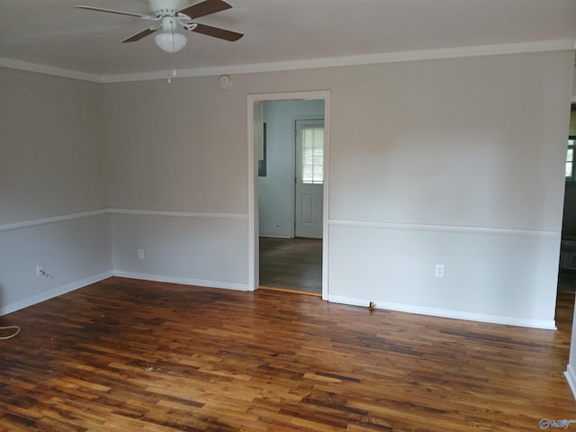 empty room featuring wood-type flooring, ceiling fan, and crown molding