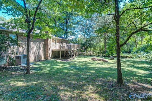 view of yard with a deck