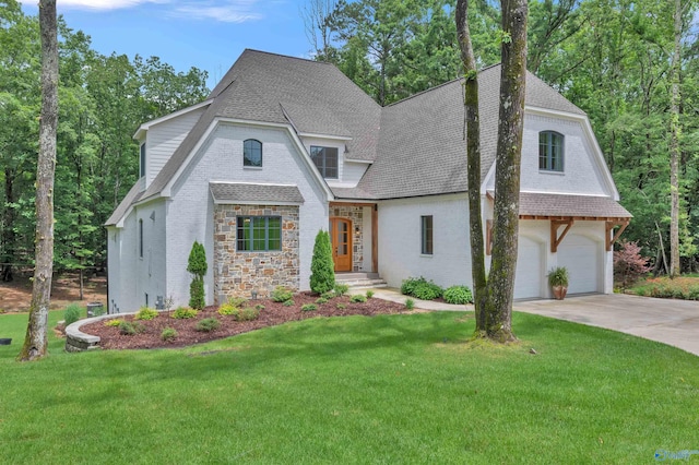13559 Monte Vedra Rd SE, Huntsville, AL 35803 - view of front of property featuring roof with shingles, driveway, a front lawn, and stone siding