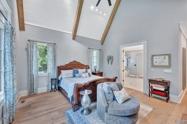 13559 Monte Vedra Rd SE, Huntsville, AL 35803 - bedroom with beam ceiling, wood finished floors, high vaulted ceiling, and ensuite bathroom