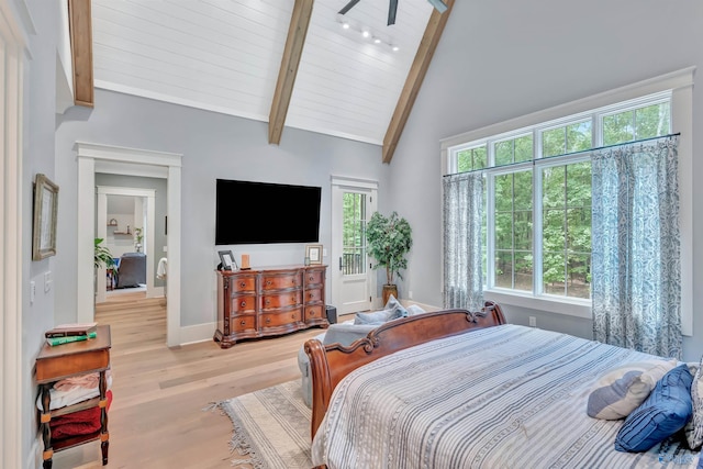 13559 Monte Vedra Rd SE, Huntsville, AL 35803 - bedroom featuring beamed ceiling, light wood-style flooring, and high vaulted ceiling