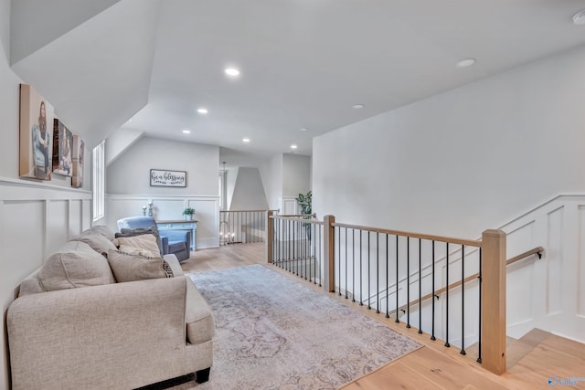 13559 Monte Vedra Rd SE, Huntsville, AL 35803 - sitting room with an upstairs landing, wood finished floors, recessed lighting, a wainscoted wall, and a decorative wall